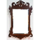 An old reproduction 18th Century mahogany fret mirror, 29 cm