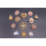 A quantity of Army Service Corps / RASC sweetheart brooches etc