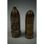 A Great War novelty pepperette in the form of an artillery shell, faced with Amiens town arms,