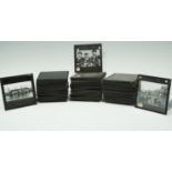 A quantity of early 20th Century monochrome photographic magic lantern slides largely depicting
