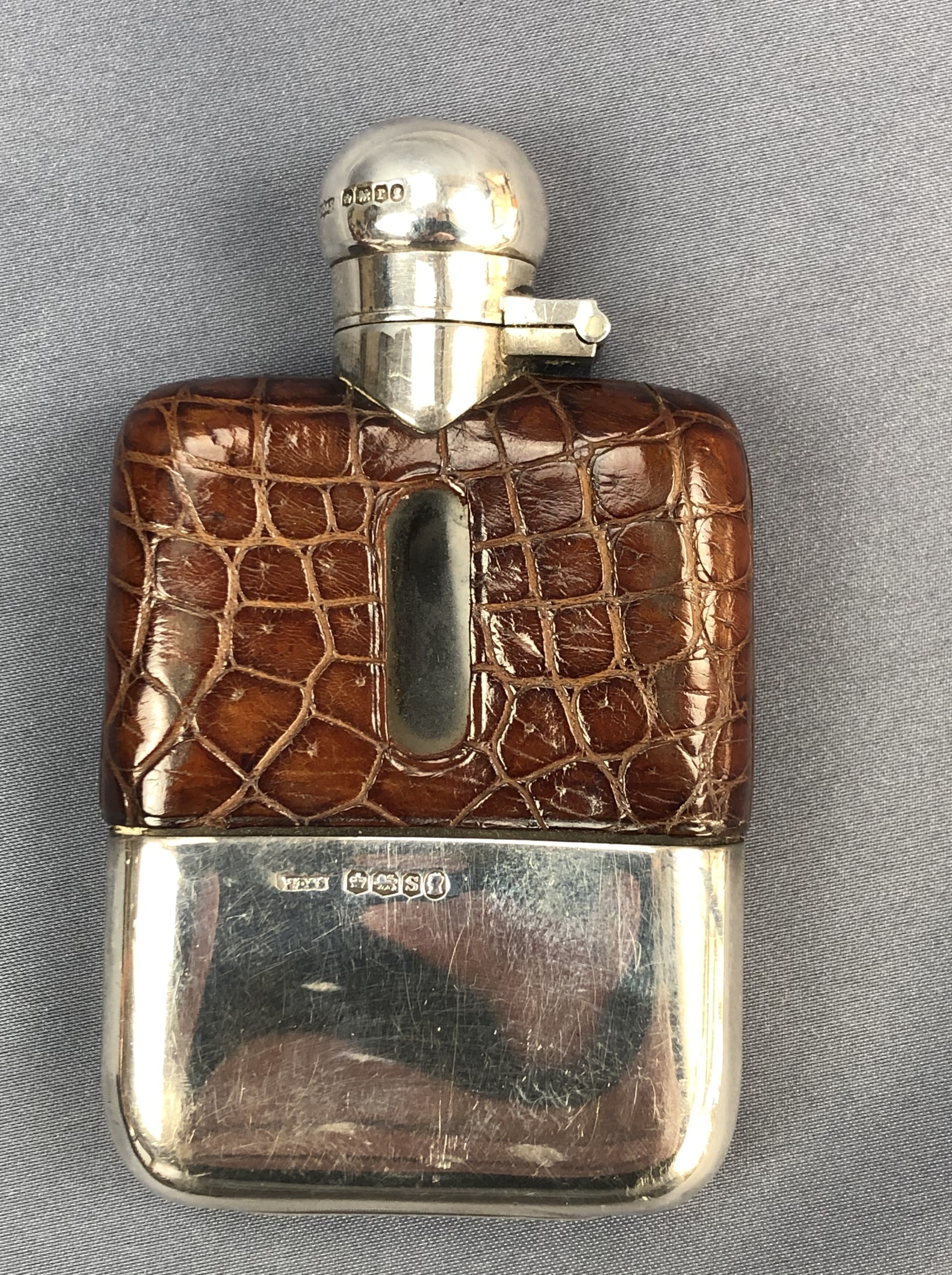 A George V silver-mounted hip flask, of typical form with hinged cap with bayonet catch, reptile - Image 3 of 5