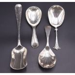 Four various silver caddy spoons