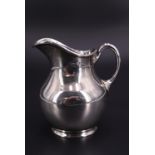 A Victorian silver baluster cream jug, Hilliard & Thomason, Birmingham, 1879. 9 cm, 108 g