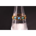 A late 19th / early 20th Century turquoise and high carat yellow metal finger ring, comprising three