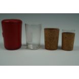 A Victorian hide-cased set of nested glass beakers