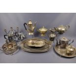 A quantity of Victorian and later electroplate including two galleried trays, candelabra, egg cups