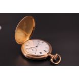 An early 20th Century Elgin rolled gold hunter pocket watch, the inner cover bearing an engraved