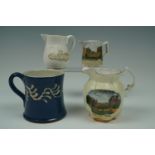 Two early 20th Century Carlisle Castle souvenir jugs, one retailed by Nicholson & Carter of