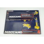 A new-old-stock cellophane-wrapped Meccano set number 4 together with a 6X conversion set