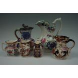 Sundry Victorian and later jugs including examples by Spode, Davenport and Mason's