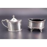 A George V silver salt cellar and mustard pot, each of Georgian-style navette form with cobalt