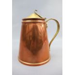 A late 19th Century W A S Benson patent copper and brass jug, 16 cm
