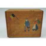 A Great War Belgian refugee-made painted wooden box bearing the inscription "Onweg naar England" (