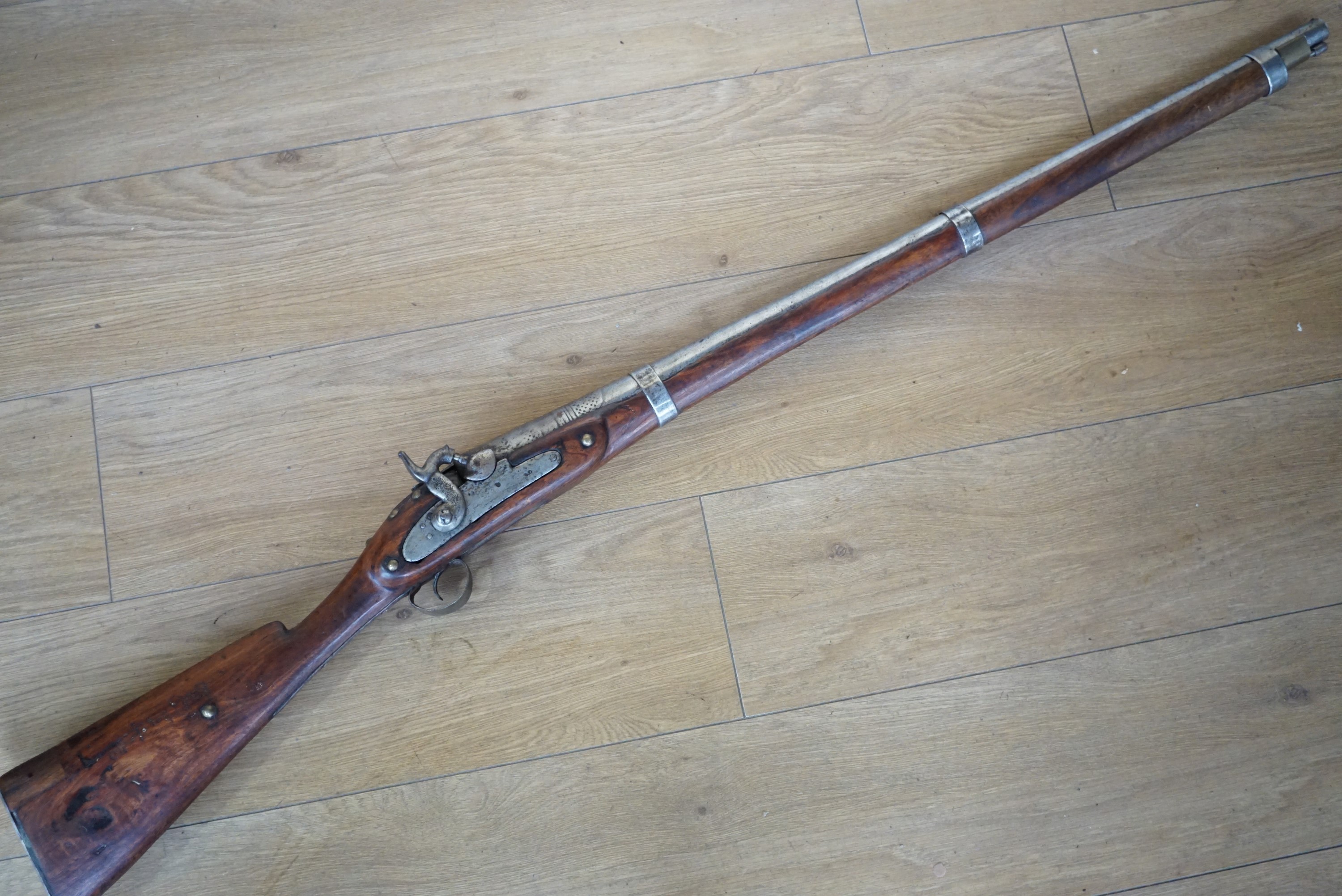 A 19th Century Indian percussion musket, utilising a modified earlier toradar musket barrel and East