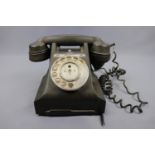 A vintage black Bakelite telephone