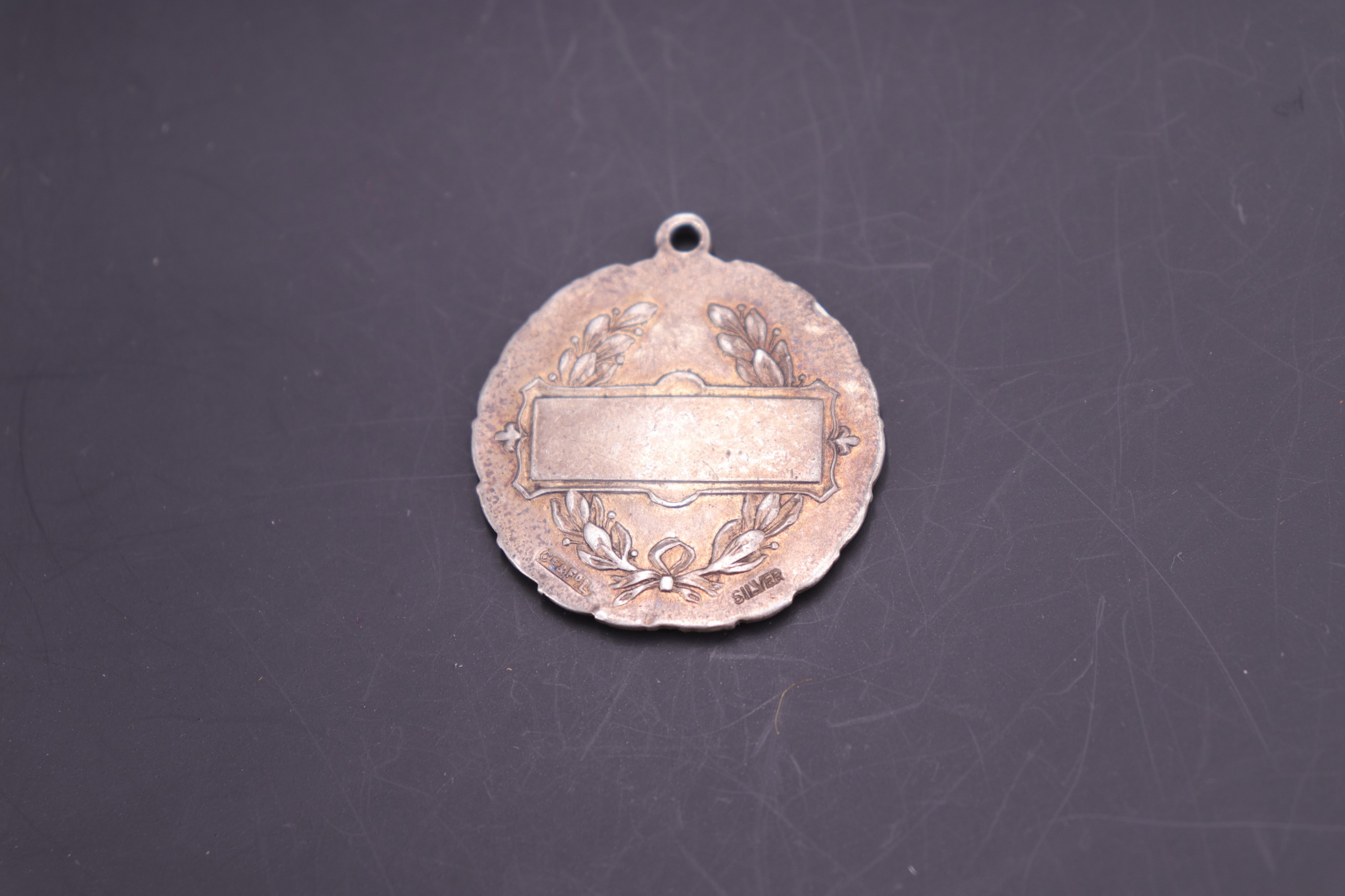 A white metal Ashington Sailors and Soldiers Great War 1914 - 1919 watch chain fob medallion, - Image 2 of 2