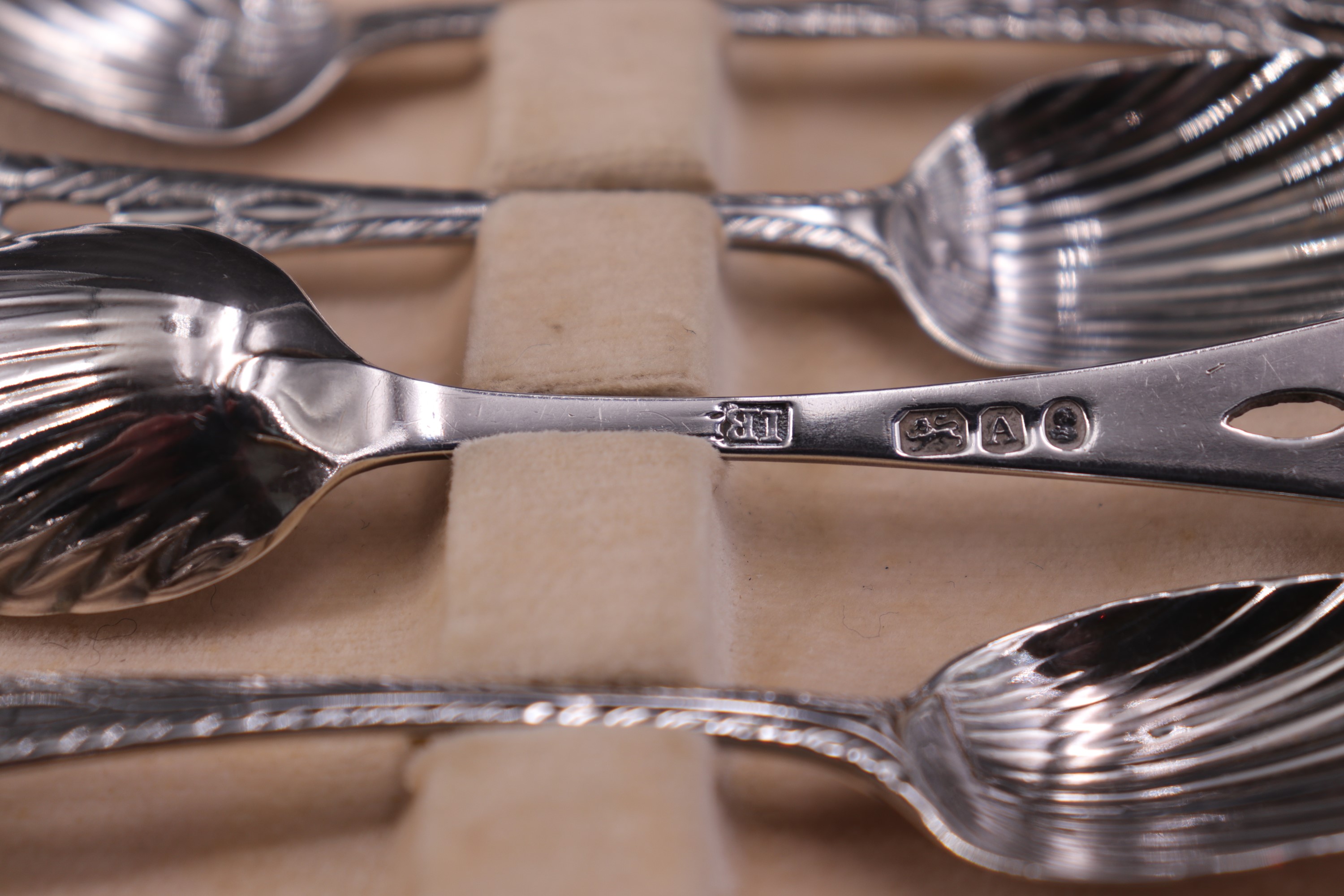 A set of six George III silver tea spoons, each having scalloped bowl, feather stem and pierced - Image 2 of 2