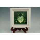 A framed Victorian hops pattern ceramic hearth tile, 22 cm