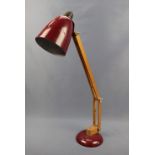 A wooden adjustable desk lamp, circa 1950s