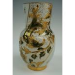 A late 19th Century Luneville vase, of ovoid form with pronounced cylindrical neck, relief-moulded