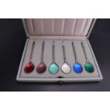 A cased set of six Danish enamelled silver-gilt coffee spoons, Michelsen, Denmark, London import