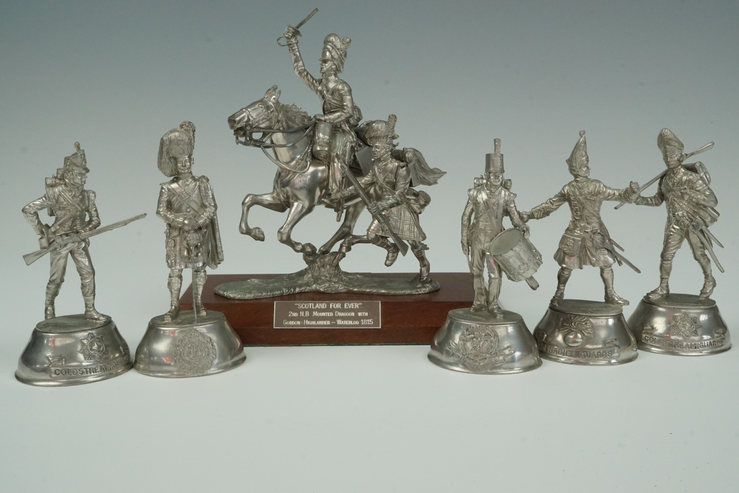 Five Charles C Stadden for Buckingham Pewter sculptures of 18th - 19th Century British soldiers,