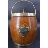 An early 20th Century electroplate mounted oak biscuit barrel