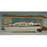 A boxed Penguin 17-inch electric High Speed Luxury Motor Cruiser "Avon"