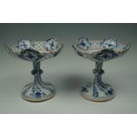 A pair of Meissen gilt-enriched blue-and-white porcelain centrepieces, 22 cm high