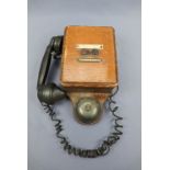 An early 20th Century wall-mounted telephone, formerly used in a railway signals box
