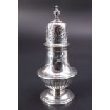 A late Victorian silver pepperette, of Georgian shouldered baluster form, Charles Stuart Harris,