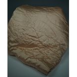 A vintage quilted satin double bedspread