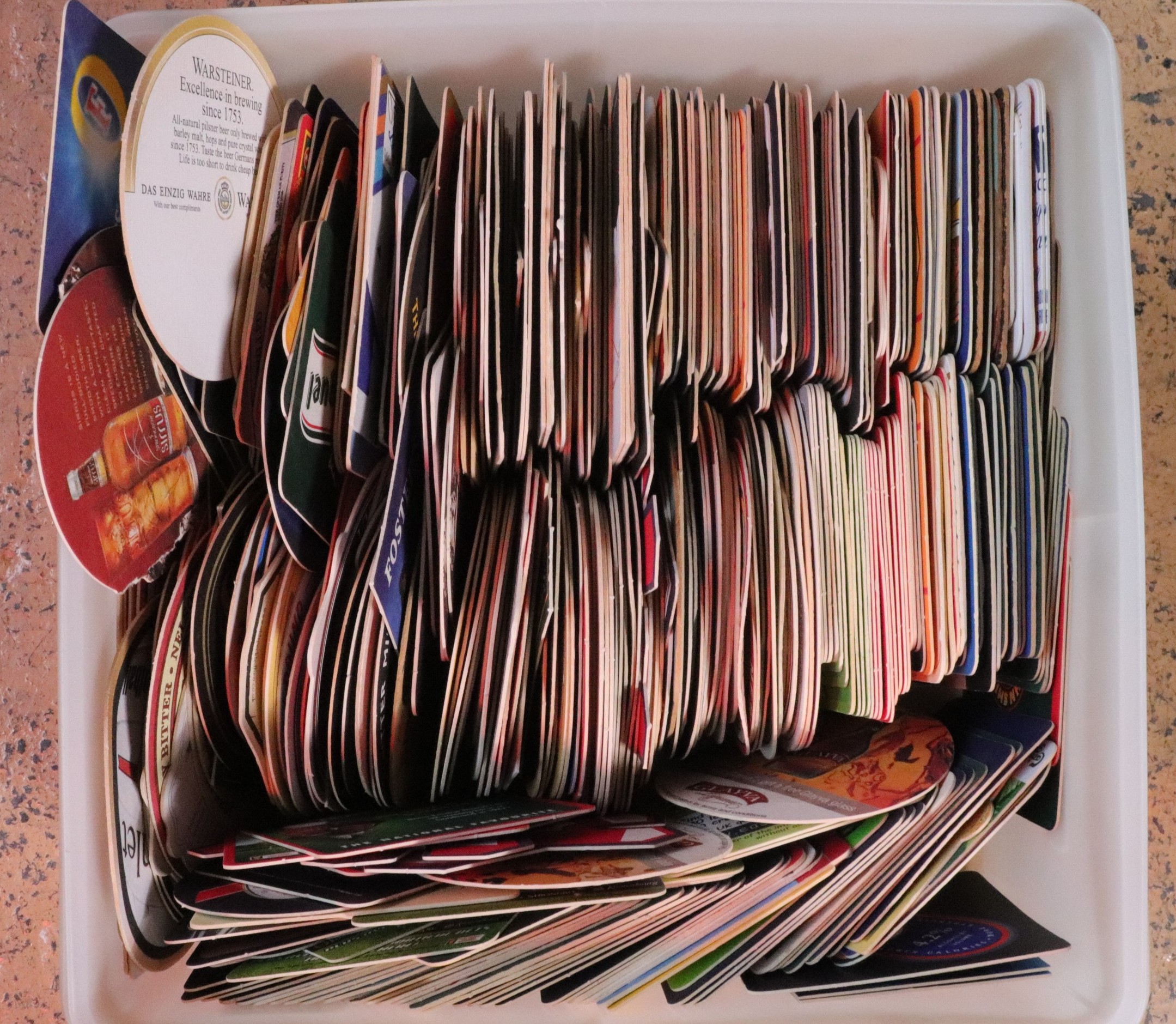 A collection of beer mats