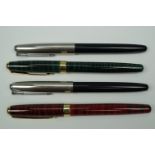 Two Parker 501 fountain pens together with two BAOER 388s