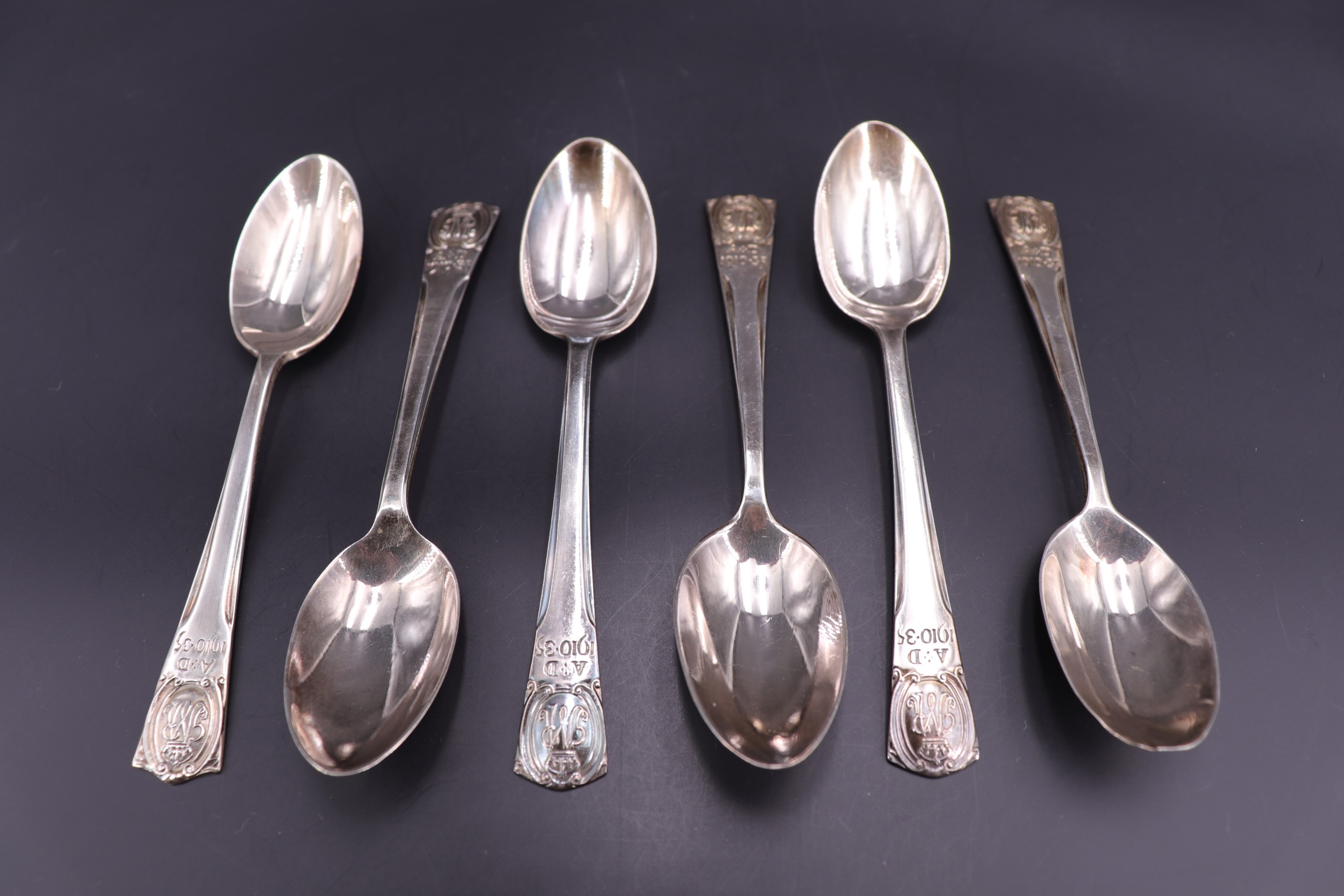 Six George V silver jubilee commemorative silver coffee spoons, R Bond & Co, Sheffield, 1925