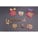 A quantity of Royal Navy / WRNS / Merchant Navy sweetheart brooches and pendants