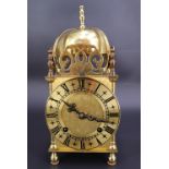 A contemporary Lionel Peck of London brass lantern clock, having a German two-train movement