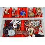 A 1960s jewellery box and contents including an aviator style oversized wristwatch