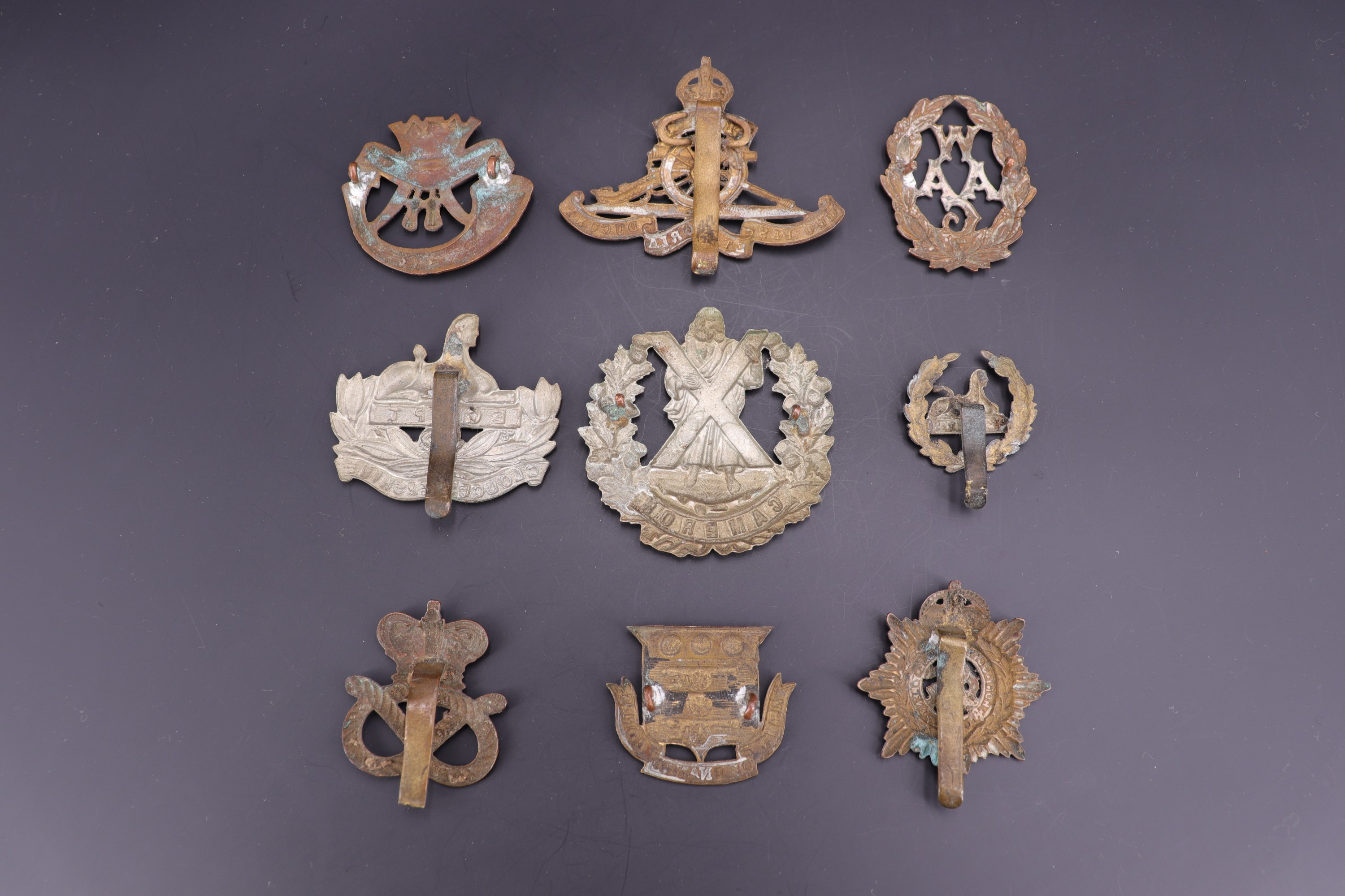 Sundry Victorian and early 20th Century British army cap badges including a Victorian Ordnance Corps - Image 2 of 2