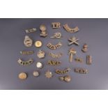 Sundry early 20th Century British badges, buttons and shoulder titles including Tank Corps and