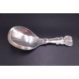 A George IV silver caddy spoon with shell and scroll stem and terminal, John Bettridge,