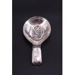 A George III engraved and filigree-inset silver caddy spoon, sponsor's mark indistinct,