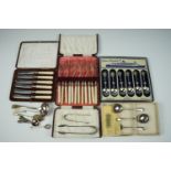 Cased sets of vintage fish cutlery, tea knives, a dessert, QEII commemorative spoons set etc