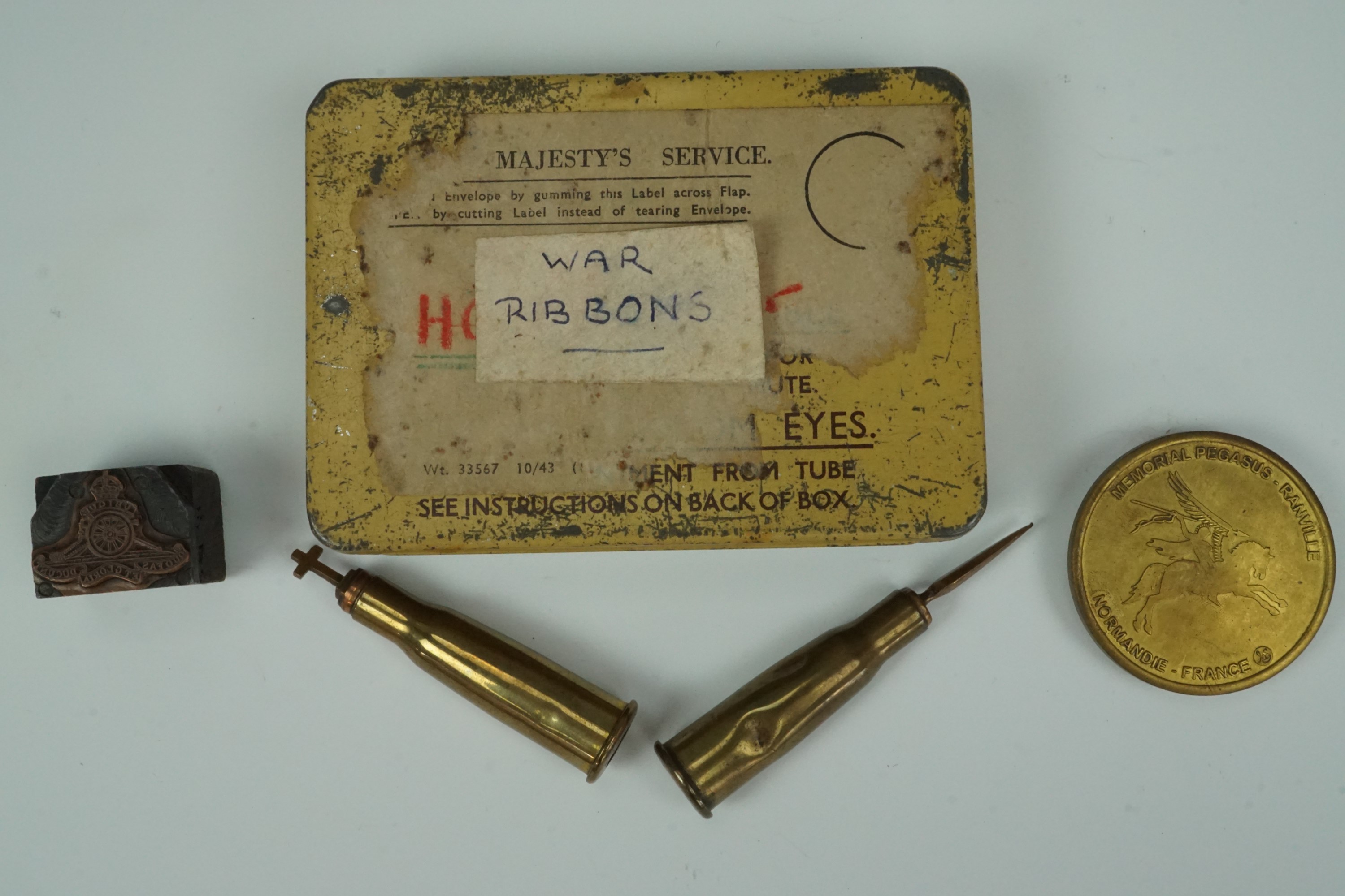 Sundry items including a Second World War anti-gas ointment tin containing military medal ribbons,