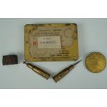 Sundry items including a Second World War anti-gas ointment tin containing military medal ribbons,