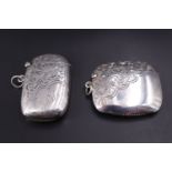 A Victorian silver Vesta case, of cushion form and foliate engraved, one face bearing a cusped