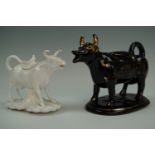 A Copeland cow creamer and one another (a/f)
