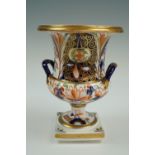 A 19th Century Derby type Imari campana form vase, 15 cm
