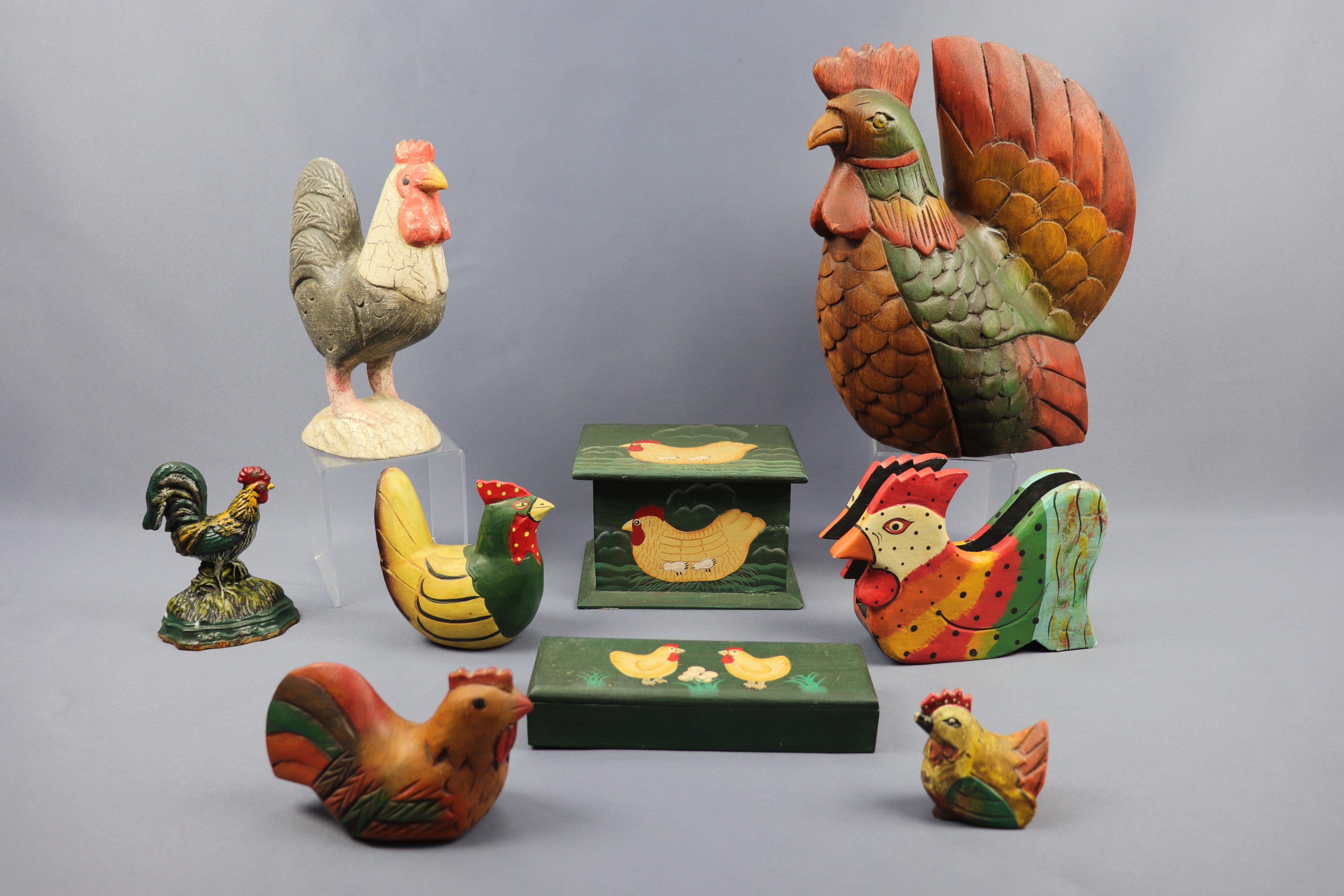 A group of contemporary carved and painted ornaments, boxes etc modelled as chickens, together