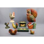 A group of contemporary carved and painted ornaments, boxes etc modelled as chickens, together